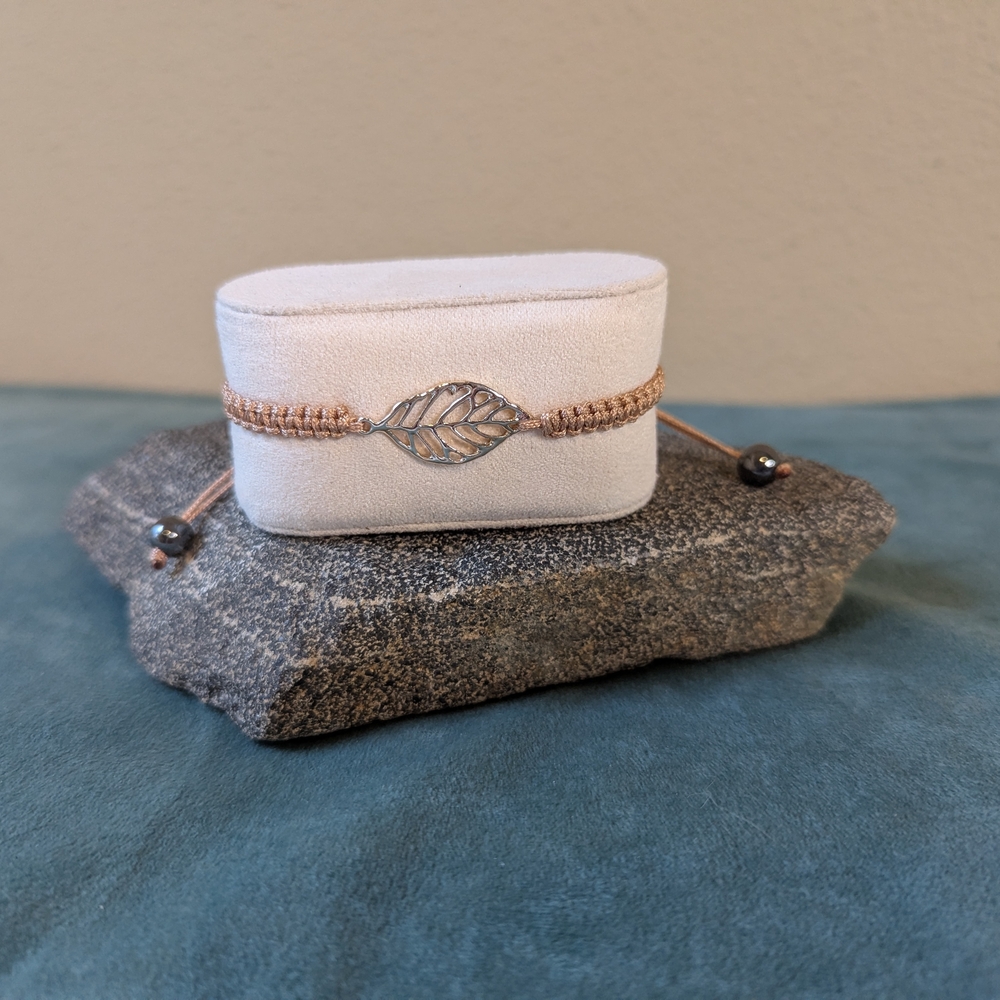 Adjustable Tan Bracelet With Leaf Design